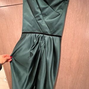 Stunning designer dress perfect for holidays or black tie event .